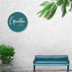 Tuinmuur met muurcirkel met tekst genieten