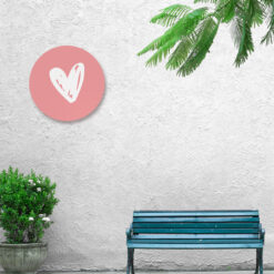 Tuin met een muurcirkel met hartje