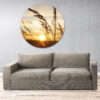 Ronde wandcirkel met zonsondergang en wuivend gras – warme natuurdecoratie